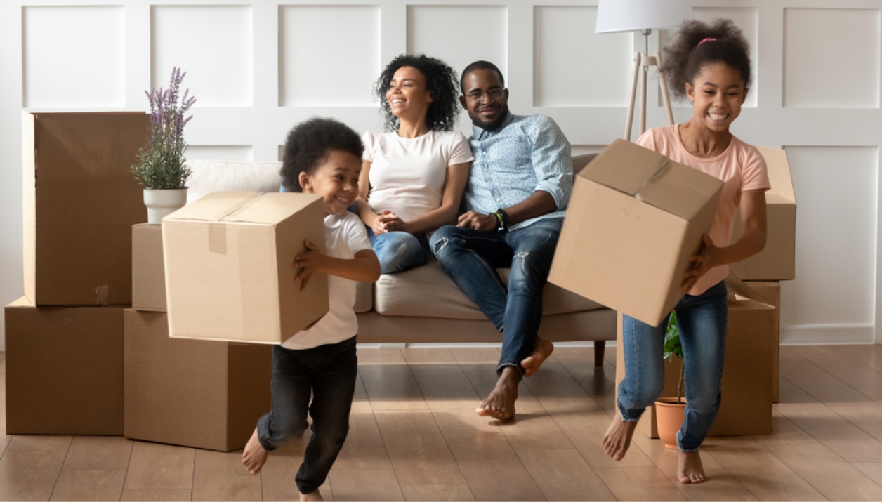 A young family with two children just moved into a new home.